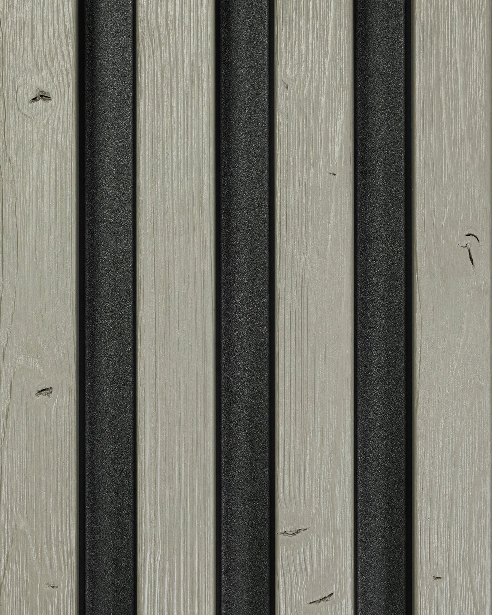 Aluwood Sample Grey (45.7 x 27 cm) facade panel by WoodUpp; gray wood slats with vertical black metal strips create a modern, textured outdoor surface.